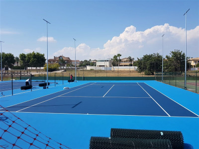 Construcción 2 pistas de tenis resina Sistema Decoturf